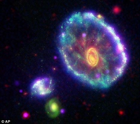 色鮮やかな車輪銀河 望遠鏡が捉えた5億光年彼方の銀河_China.org.cn