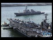 米海軍第7艦隊の空母｢ジョージ･ワシントン｣が21日、25日から実施される米韓合同軍事演習参加のために、韓国の釜山（プサン）港に寄港した。写真は釜山港で撮影された｢ジョージ･ワシントン｣の搭載機。 ｢中国網日本語版(チャイナネット)｣　2010年7月22日