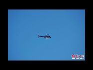 上空から中国の漁政船を撮影する日本の艦載機