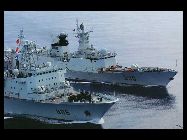 海上で燃料補給する第7陣の遠洋航行護衛編隊　　　　中国国内の軍事に関する『艦船知識』や『現代艦船』『艦載武器』など多くの定期刊行物は最近、中国海軍潜水艦基地や国産新式戦艦群、輸入された主力戦艦の写真を公開した。 ｢中国網日本語版(チャイナネット)｣　2010年12月14日