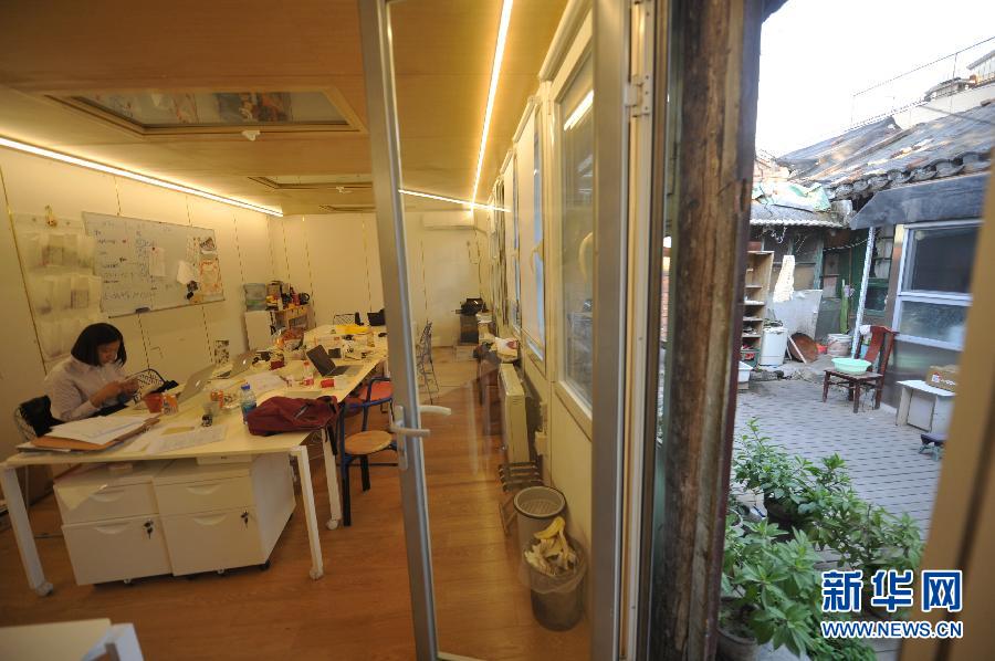 （城乡热点）（3）让古旧四合院重获新生的内盒建筑