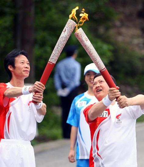 Очередной этап эстафеты огня Пекинской Олимпиады начался в Цзинганшане