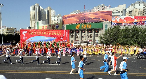 В Урумчи начался очередной этап эстафеты огня Пекинской Олимпиады