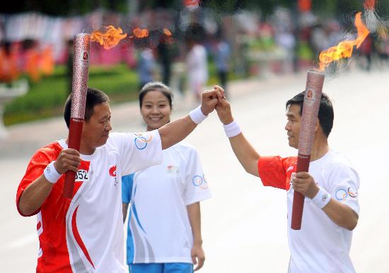 19 июня: В Шихэцзы завершился очередной этап эстафеты огня Пекинской Олимпиады