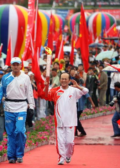 24 июня: В Синине завершилась эстафета огня Пекинской Олимпиады