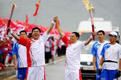 В г. Далянь стартовал очередной этап эстафеты огня Пекинской Олимпиады