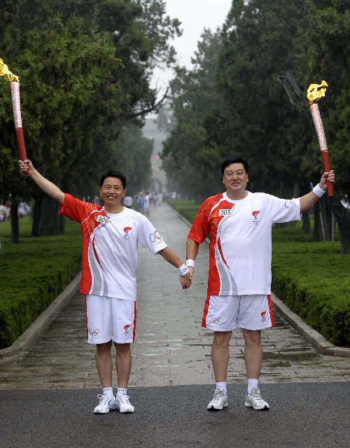 22 июля: В Цюйфу прошел очередной этап эстафеты огня Пекинской Олимпиады1