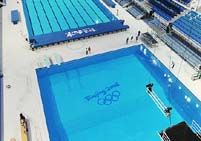 Олимпийские эмблемы под водой в 'Водном кубе'