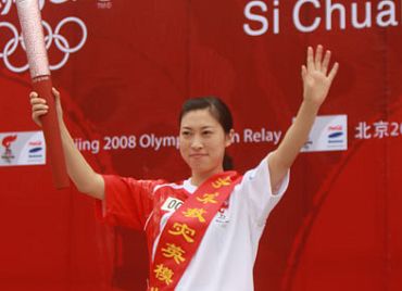 3 августа: В Гуанъани прошел очередной этап эстафеты огня Пекинской Олимпиады