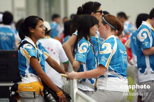 Иностранные волонтеры начали служить пекинской Олимпиаде 1