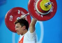 Китайский парень Чжан Сянсян завоевал золотую медаль в соревновании по тяжелой атлетике в весовой категории до 62 кг.