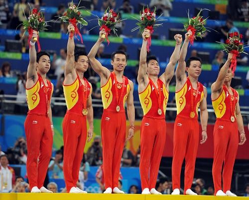 Мужская сборная по гимнастике Китая завоевала «золото» через 8 лет3