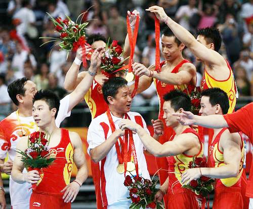 Мужская сборная по гимнастике Китая завоевала «золото» через 8 лет4