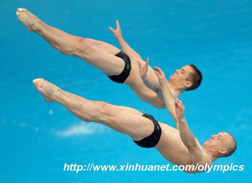 Красивейший третий прыжок российских спортсменов в соревновании по синхронным прыжкам в воду с 3-метрового трамплина среди мужчин