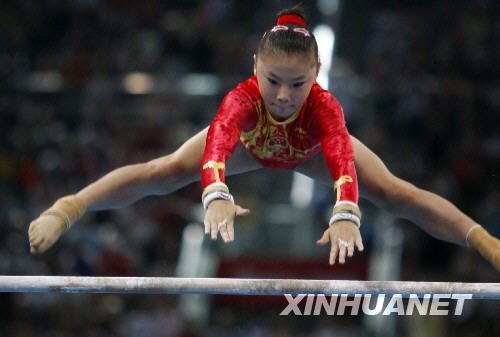 Китайская гимнастка Хэ Кэсинь завоевала 'золото' в упражнениях на брусьях4