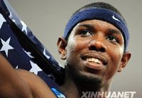 Спортсмен из США Ангело Тэйлор -- чемпион Пекинской Олимпиады в беге с барьерами на 400 м среди мужчин
