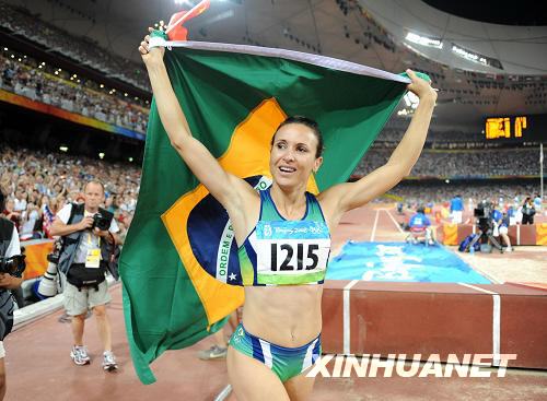 Срочно: Спортсменка из Бразилии М. Магги -- чемпионка Пекинской Олимпиады по прыжкам в длину2