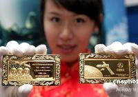 Выпущены золотые слитки, инкрустированные алмазами, в честь корабля «Шэньчжоу-7»