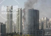 В 20-этажном здании в Шанхае произошел пожар