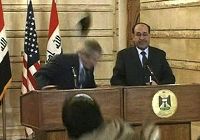 Иракский корреспондент бросил в Джорджа Буша свою обувь