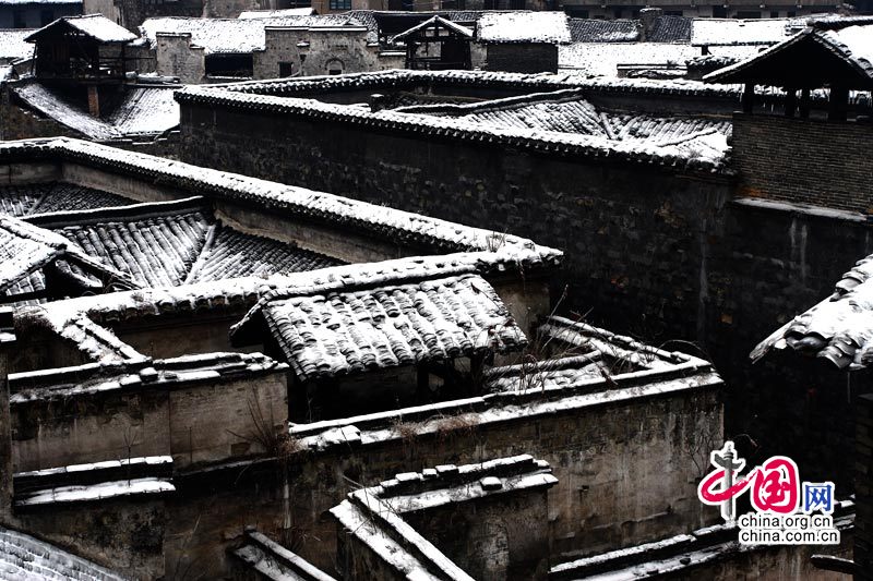 Древний торговый городок Хунцзян провинции Хунань, покрытый снегом