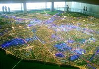 На фото: Вид сверху на макет ночного Тяньцзиня в Тяньцзиньском выставочном комплексе городского планирования (фото снято 21 мая 2009 г.)