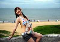 Участницы конкурса ?Мисс Азия? продемонстрировали свою красоту на морском побережье города Хайкоу