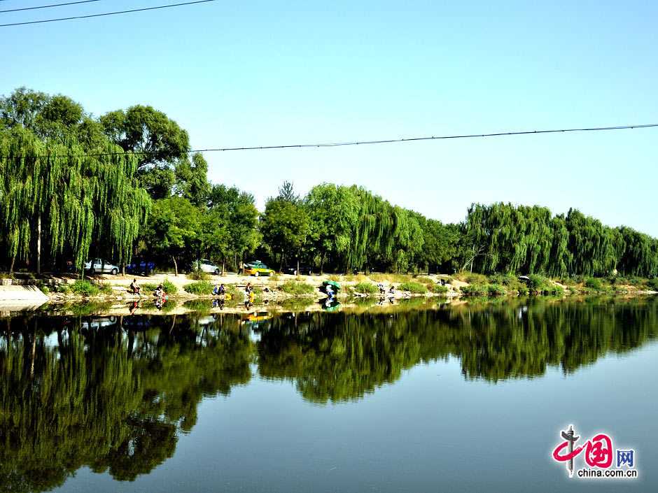 Водно-болотные угодья Даосянху Пекина - тихое место в шумном городе