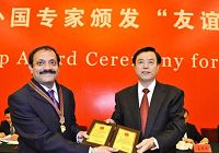 В Пекине состоялась церемония вручения иностранным специалистам медалей 'Дружба' 2009 года