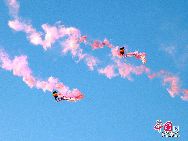15 ноября в аэропорту Шахэ Пекина прошли показательные полеты и выступления парашютистов в честь 60-летия образования ВВС НОАК, в которых приняли участие пилотажная группа ВВС НОАК «1 августа» и парашютная команда. 