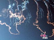 15 ноября в аэропорту Шахэ Пекина прошли показательные полеты и выступления парашютистов в честь 60-летия образования ВВС НОАК, в которых приняли участие пилотажная группа ВВС НОАК «1 августа» и парашютная команда. 