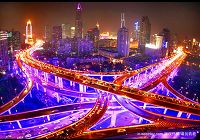 Прекрасные снимки вечернего Шанхая, на которых видно применение светодиодных ламп для освещения скоростных автодорог