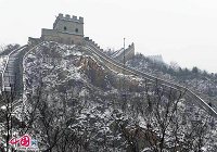 Участок Цзюйюнгуань Великой китайской стены после снегопада