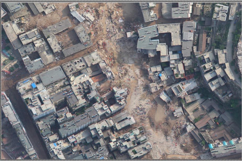Фотографии после серьезных оползней и наводнений в узеде Чжоуцюй, сделанные с высоты птичьего полета самолетом-беспилотником