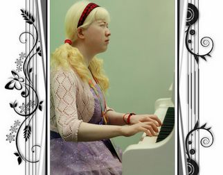 Герои ЭКСПО-2010 в Шанхае: лепая пианистка Ян Цзеинь