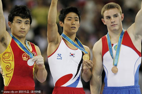 Казахский гимнаст Станислав Валиев выиграл бронзовую медаль в финале соревнования по опорным прыжкам в 16-х Азиатских играх в Гуанчжоу