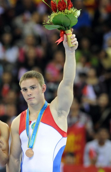 Казахский гимнаст Станислав Валиев выиграл бронзовую медаль в финале соревнования по опорным прыжкам в 16-х Азиатских играх в Гуанчжоу