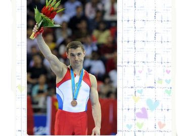 Ильдар Валиев из Казахстана выиграл бронзовую медаль в финале соревнования по упражнениям на параллельных брусьях в Азиатских играх в Гуанчжоу