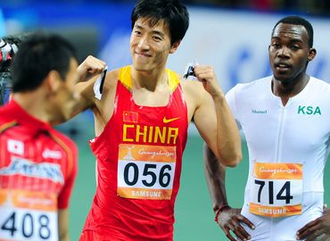 Симпатичные выражения лица известного китайского легкоатлета Лю Сяна в Азиатских играх в Гуанчжоу