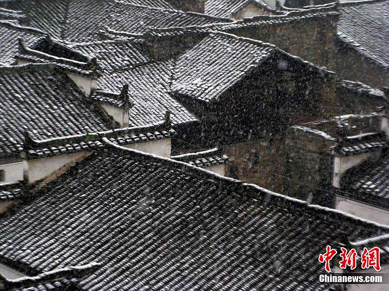 Живописный пейзаж самой красивой деревни Китая Уюань после снегопада 