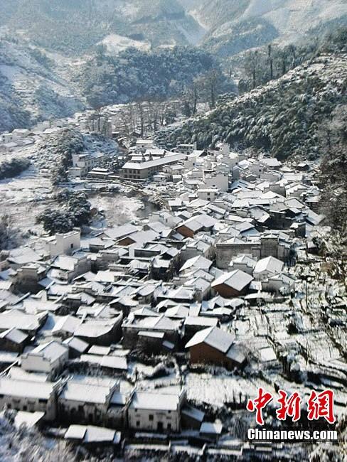 Красивые пейзажи после снегопада на юге Китая: деревня Уюань