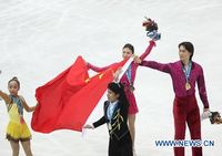 /Азиада-2011/ Китайские фигуристы Пан Цин и Тун Цзянь выиграли 'золото' в парном фигурном катании 