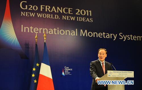 В Нанкине в присутствии президента Франции Саркози и китайского вице-премьера Ван Цишаня открылся симпозиум по реформе международной монетарной системы1