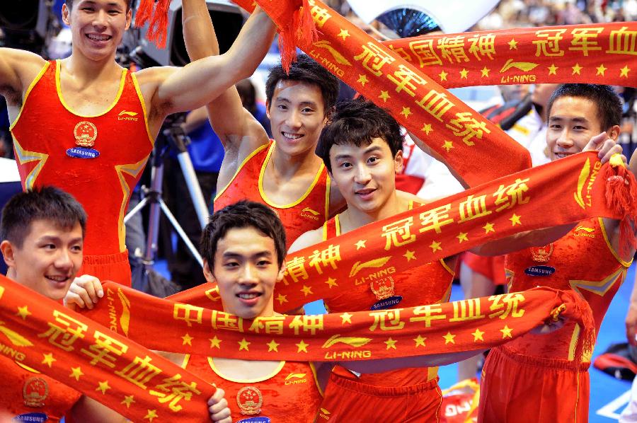 Мужская сборная Китая завоевала 'золото' в командном зачете на проходящем в Японии чемпионате мира по спортивной гимнастике, набрав 275,161 балла. 