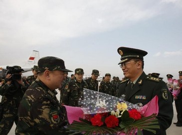 Китайские участники международных антитеррористических учений вернулись домой