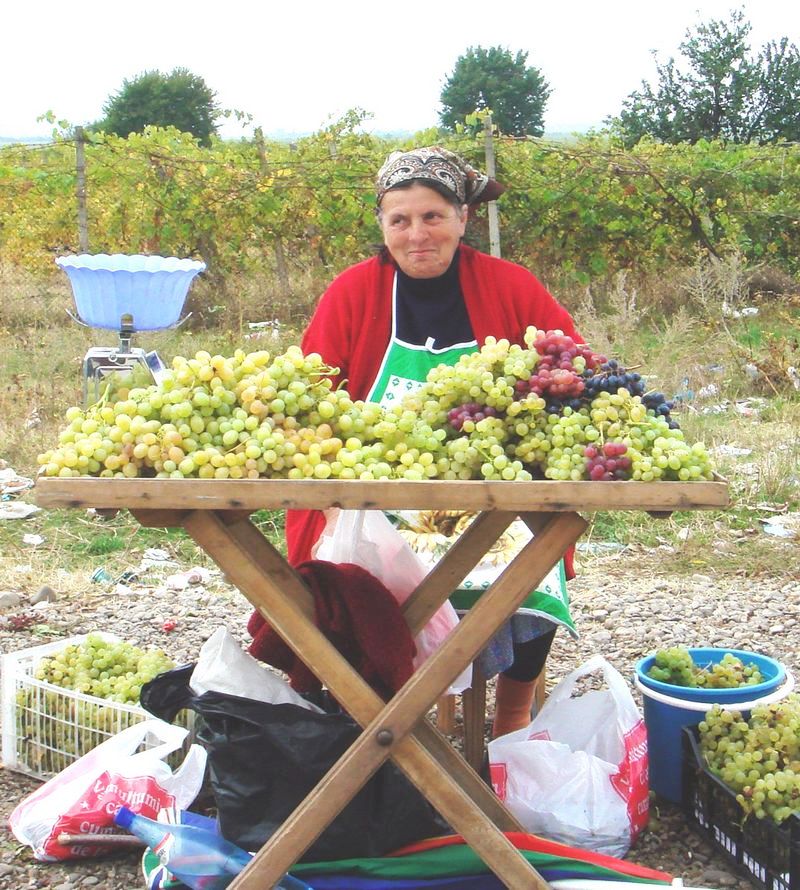 Крестьянка, продающая виноград