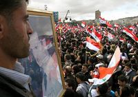 Миллионы сирийцев провели шествия в поддержку правительства