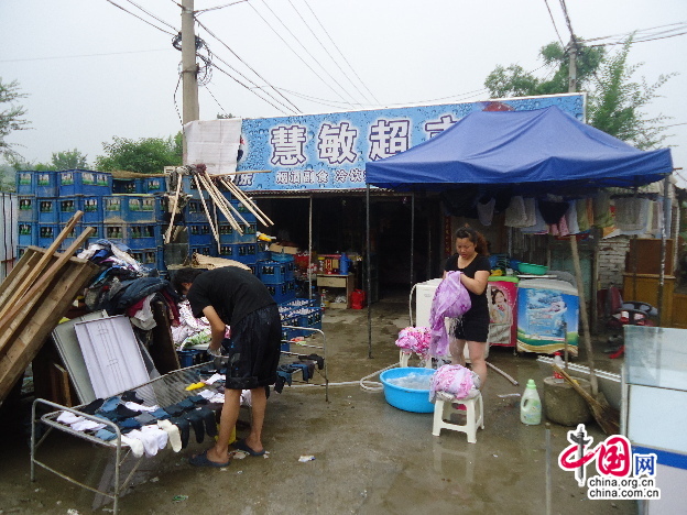 После сильных ливней в районе Фаньшань Пекина идут восстановительные работы 5