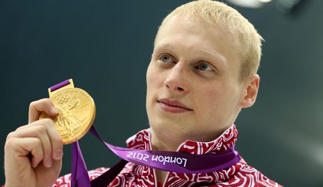 /Олимпиада-2012/ Россиянин Илья Захаров завоевал 'золото' Олимпиады в Лондоне в прыжках в воду с 3-метрового трамплина, у китайцев -- 'серебро' и 'бронза'