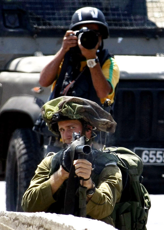 Фотожурналисты, работающие в зонах конфликтов между Палестиной и Израилем4